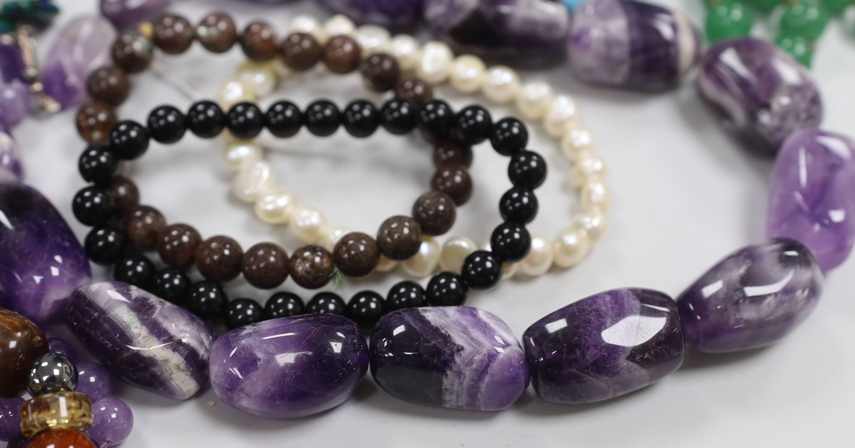 A group of assorted bead necklaces